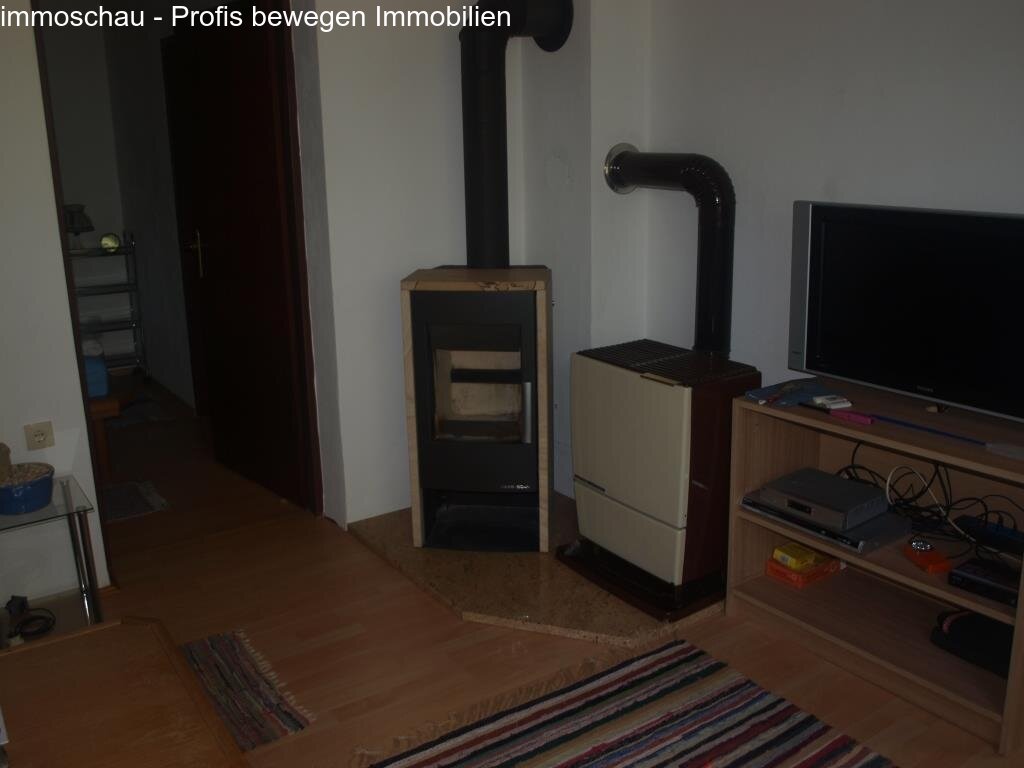 Wohnzimmer mit Öl und Holzheizung